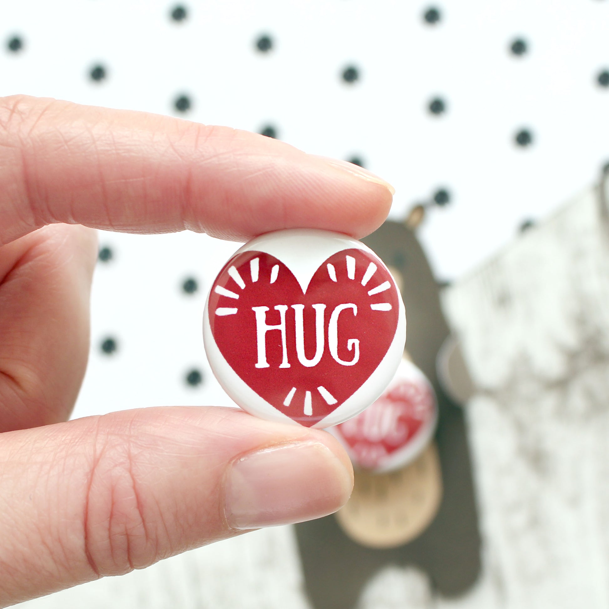 Close up of hug badge