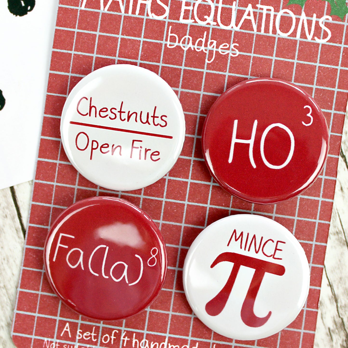 Close up of Christmas maths badges