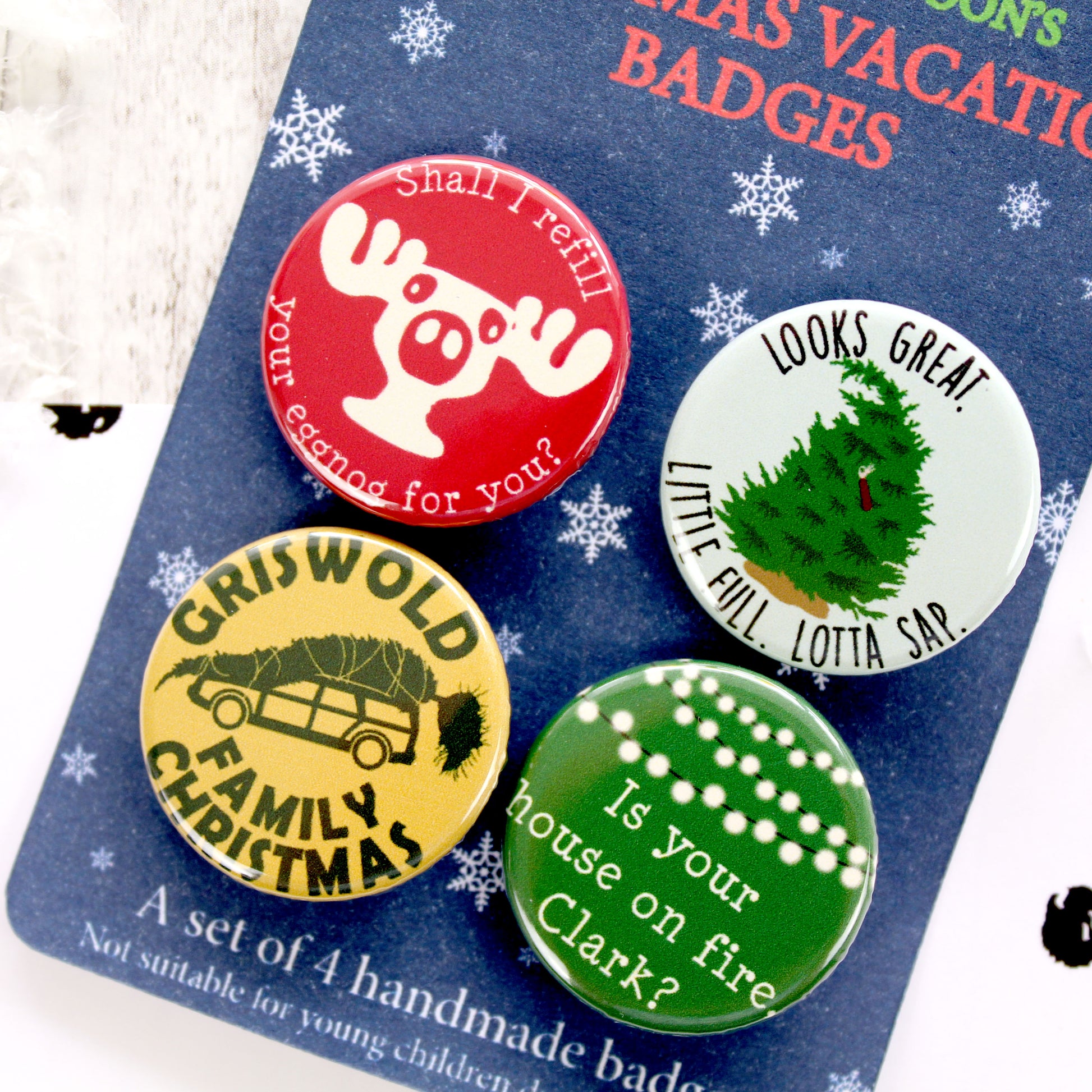 Close up of Christmas Vacation Badges