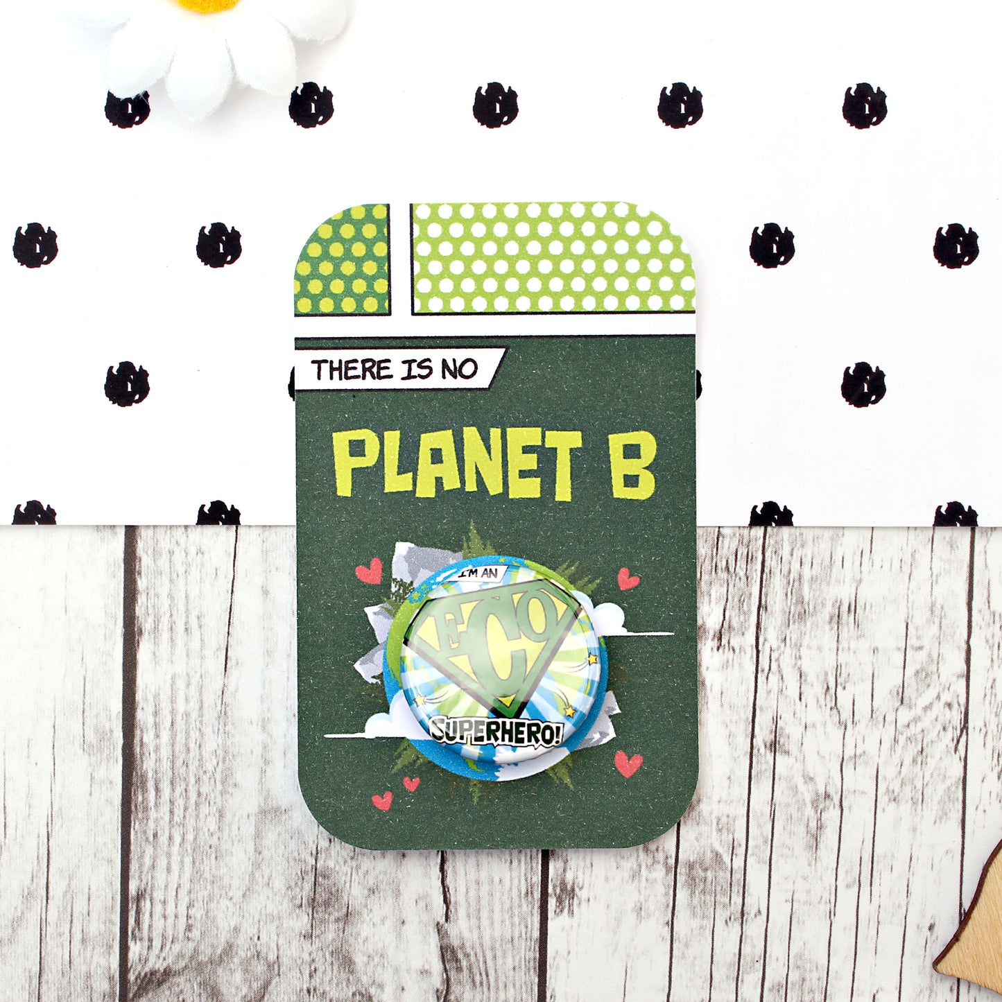 I'm an Eco Superhero badge on a There is no planet B card backing