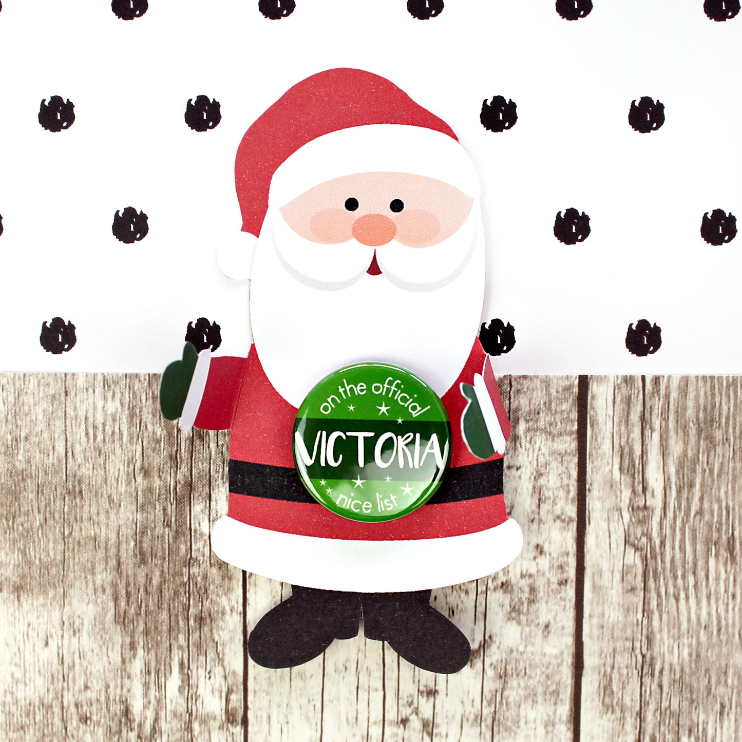 Santa with an official nice list badge