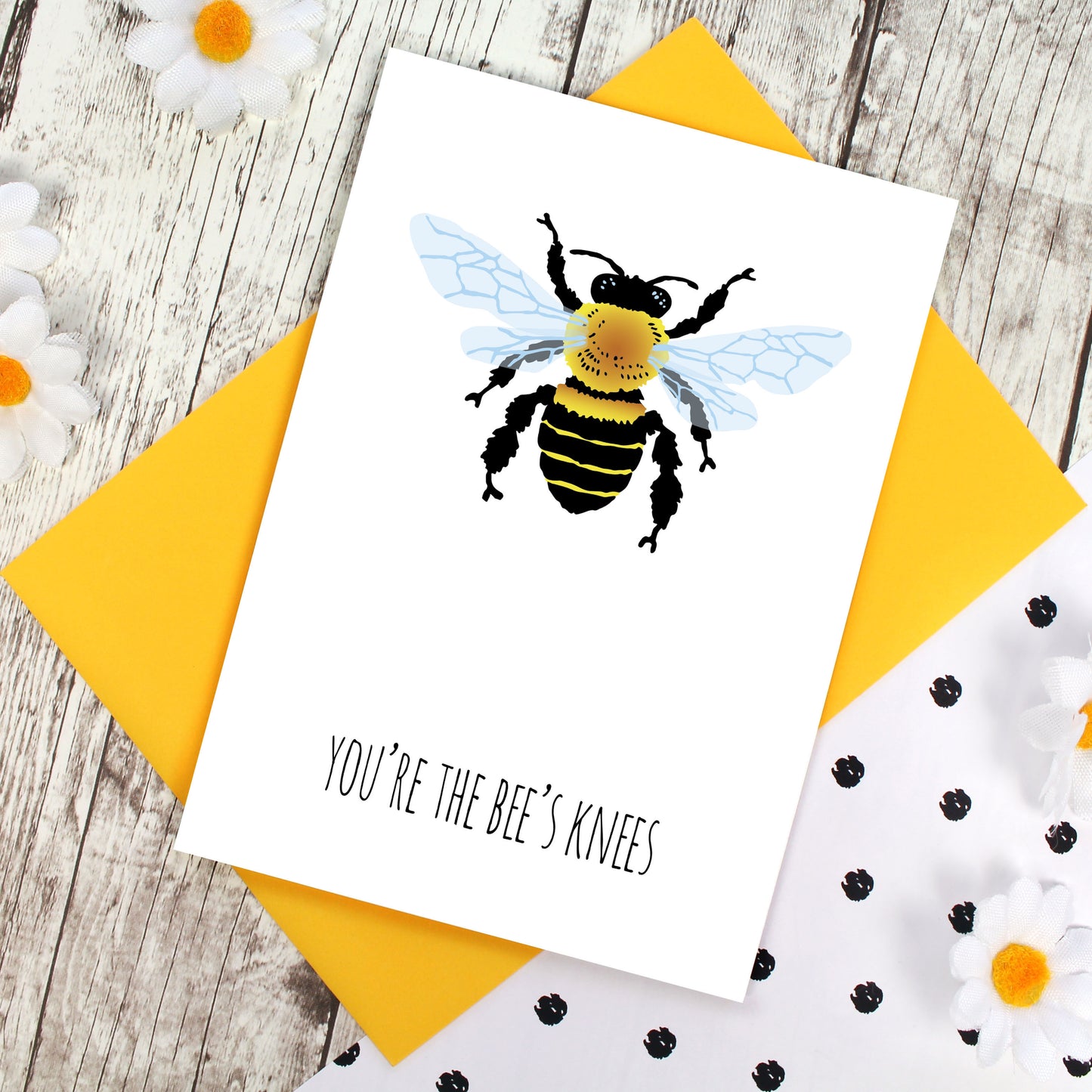 Honeybee illustration with words 'you're the bee's knees'